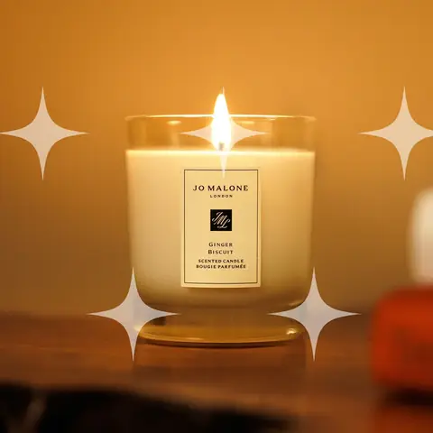 Lit Candle in Amber Light
