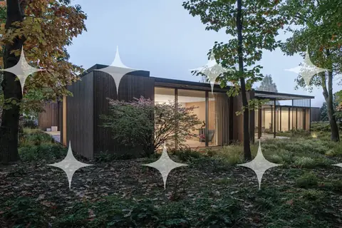 Timber House Among Autumn Trees