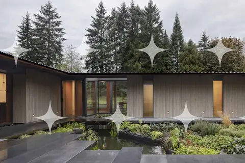 House Above a Reflecting Channel