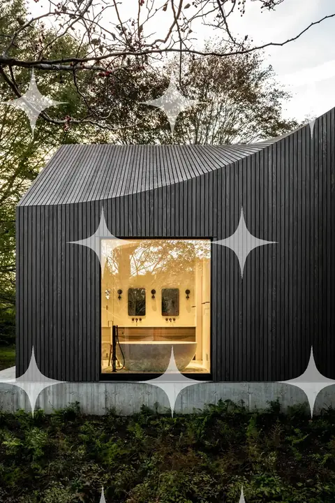 Curved Roof Cabin at Dusk