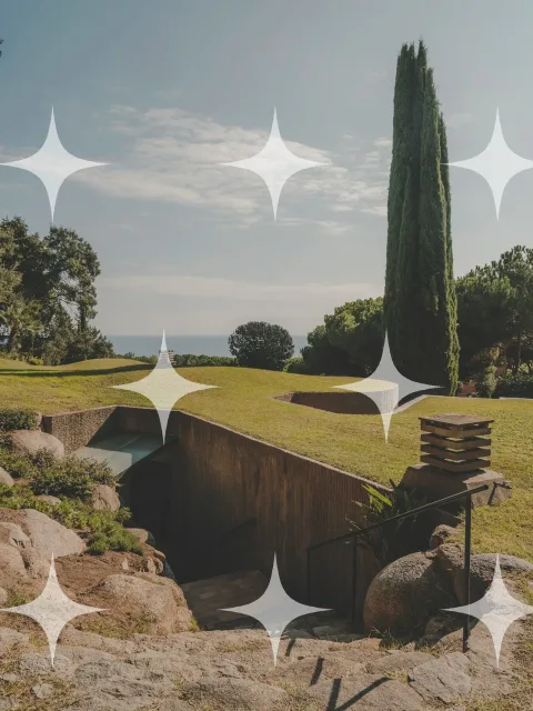 Buried Pavilion in a Boulder Field