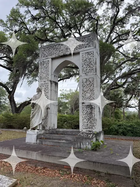 Carved Memorial Arch with Statue
