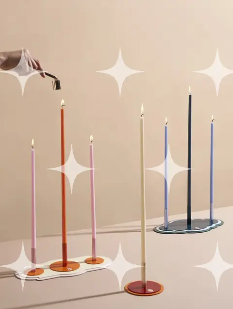 Colorful Taper Candles on Modern Stands