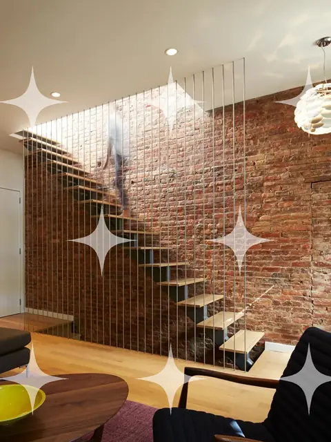 Loft with Exposed Brick and Cable Stair