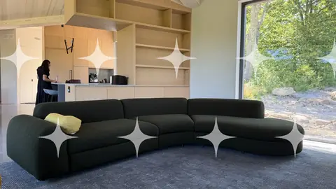 Green Sofa in an Open Plan Room