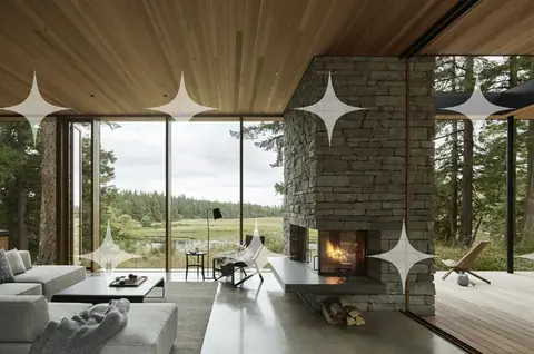 Stone Fireplace in a Glass Room