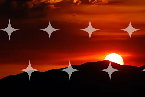 Red Sunset Behind a Dark Ridge