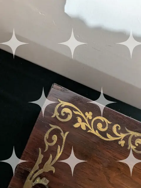 Gilt Scrollwork Inlay on Walnut